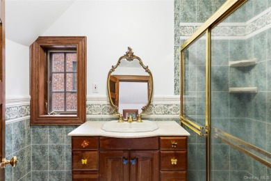 Sited adjacent to, and enjoying the views of the expansive on North Hempstead Country Club in New York - for sale on GolfHomes.com, golf home, golf lot