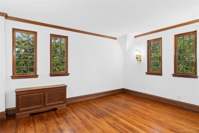 Sited adjacent to, and enjoying the views of the expansive on North Hempstead Country Club in New York - for sale on GolfHomes.com, golf home, golf lot