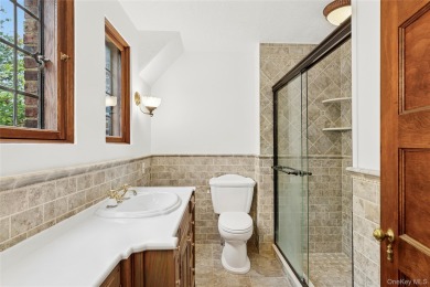 Sited adjacent to, and enjoying the views of the expansive on North Hempstead Country Club in New York - for sale on GolfHomes.com, golf home, golf lot