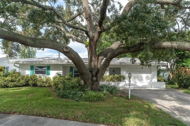 This beautiful renovated block-constructed home is in the 55+ on Mainlands Golf Club in Florida - for sale on GolfHomes.com, golf home, golf lot