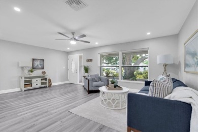 This beautiful renovated block-constructed home is in the 55+ on Mainlands Golf Club in Florida - for sale on GolfHomes.com, golf home, golf lot