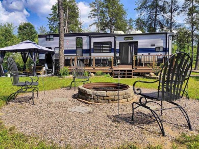 Turnkey getaway in the Town of Rome! This .52-acre lot offers on Sand Valley Golf Course in Wisconsin - for sale on GolfHomes.com, golf home, golf lot