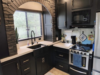 Turnkey getaway in the Town of Rome! This .52-acre lot offers on Sand Valley Golf Course in Wisconsin - for sale on GolfHomes.com, golf home, golf lot
