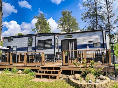 Turnkey getaway in the Town of Rome! This .52-acre lot offers on Sand Valley Golf Course in Wisconsin - for sale on GolfHomes.com, golf home, golf lot
