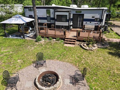 Turnkey getaway in the Town of Rome! This .52-acre lot offers on Sand Valley Golf Course in Wisconsin - for sale on GolfHomes.com, golf home, golf lot