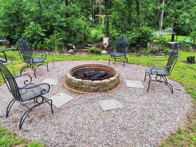 Turnkey getaway in the Town of Rome! This .52-acre lot offers on Sand Valley Golf Course in Wisconsin - for sale on GolfHomes.com, golf home, golf lot