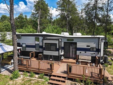 Turnkey getaway in the Town of Rome! This .52-acre lot offers on Sand Valley Golf Course in Wisconsin - for sale on GolfHomes.com, golf home, golf lot