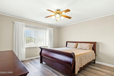 Discover a hidden gem in the heart of Panama City Beach--Leisure on Holiday Golf Club in Florida - for sale on GolfHomes.com, golf home, golf lot