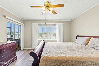 Discover a hidden gem in the heart of Panama City Beach--Leisure on Holiday Golf Club in Florida - for sale on GolfHomes.com, golf home, golf lot