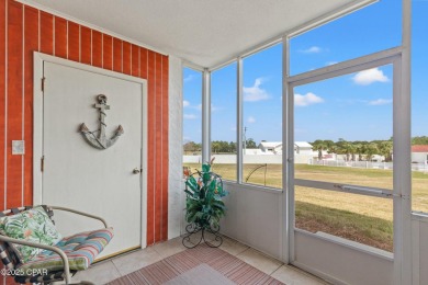 Discover a hidden gem in the heart of Panama City Beach--Leisure on Holiday Golf Club in Florida - for sale on GolfHomes.com, golf home, golf lot