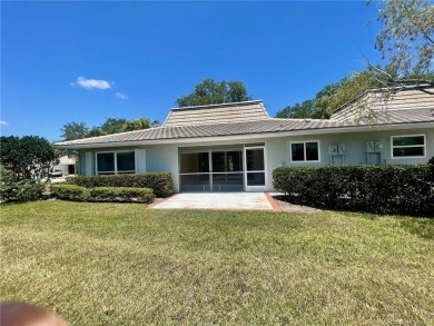 This 2/2 plus den with a 1 car garage is set on a peaceful lake on Martin Downs Country Club in Florida - for sale on GolfHomes.com, golf home, golf lot