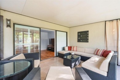Welcome to this beautifully updated 2 bedroom, 2 and a half bath on East Lake Woodlands Country Club in Florida - for sale on GolfHomes.com, golf home, golf lot