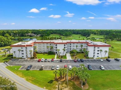 Discover a hidden gem in the heart of Panama City Beach--Leisure on Holiday Golf Club in Florida - for sale on GolfHomes.com, golf home, golf lot