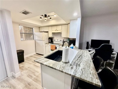 Affordable 2 bedroom 2 bath GROUND FLOOR CORNER UNIT in Golfside on Lehigh Resort Club in Florida - for sale on GolfHomes.com, golf home, golf lot