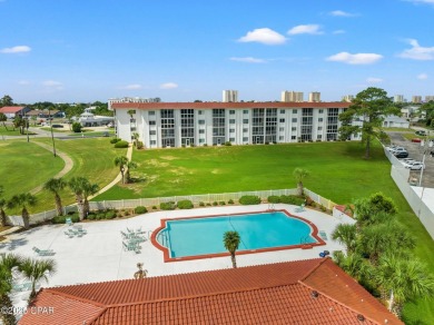 Discover a hidden gem in the heart of Panama City Beach--Leisure on Holiday Golf Club in Florida - for sale on GolfHomes.com, golf home, golf lot