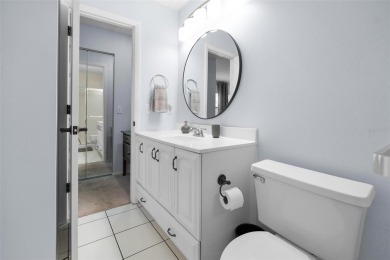 Welcome to this beautifully updated 2 bedroom, 2 and a half bath on East Lake Woodlands Country Club in Florida - for sale on GolfHomes.com, golf home, golf lot
