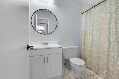 Welcome to this beautifully updated 2 bedroom, 2 and a half bath on East Lake Woodlands Country Club in Florida - for sale on GolfHomes.com, golf home, golf lot