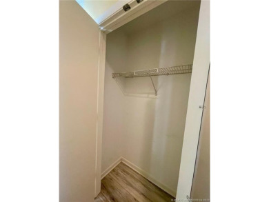 This 2/2 plus den with a 1 car garage is set on a peaceful lake on Martin Downs Country Club in Florida - for sale on GolfHomes.com, golf home, golf lot