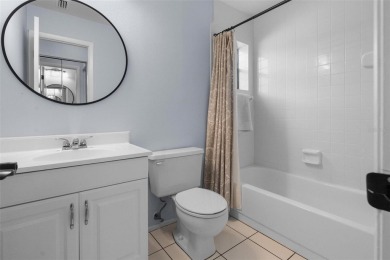 Welcome to this beautifully updated 2 bedroom, 2 and a half bath on East Lake Woodlands Country Club in Florida - for sale on GolfHomes.com, golf home, golf lot