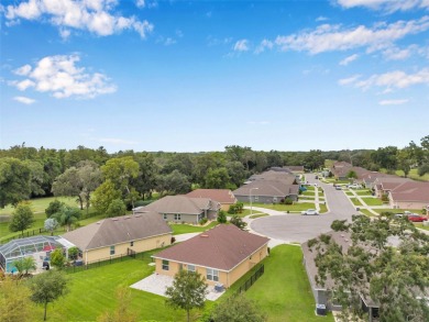 Welcome to this beautifully maintained 3-bedroom, 2-bathroom on Meadow Oaks Golf and Country Club in Florida - for sale on GolfHomes.com, golf home, golf lot