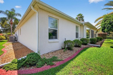 GORGEOUS, 3/2 BLOCK and STUCCO Gardenia featuring a FABULOUS on The Links of Spruce Creek in Florida - for sale on GolfHomes.com, golf home, golf lot