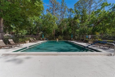 Welcome to this beautifully updated 2 bedroom, 2 and a half bath on East Lake Woodlands Country Club in Florida - for sale on GolfHomes.com, golf home, golf lot