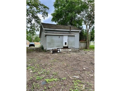 Two bedroom bungalow between Duck Lake and White Lake on a wide on Highland Hills Golf Course in Michigan - for sale on GolfHomes.com, golf home, golf lot