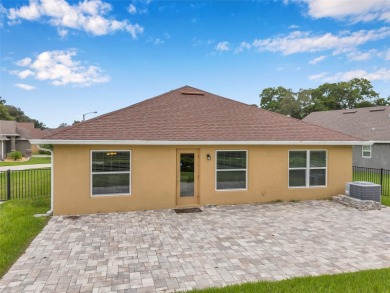 Welcome to this beautifully maintained 3-bedroom, 2-bathroom on Meadow Oaks Golf and Country Club in Florida - for sale on GolfHomes.com, golf home, golf lot