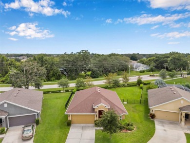 Welcome to this beautifully maintained 3-bedroom, 2-bathroom on Meadow Oaks Golf and Country Club in Florida - for sale on GolfHomes.com, golf home, golf lot