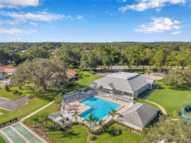 Welcome to this beautifully maintained 3-bedroom, 2-bathroom on Meadow Oaks Golf and Country Club in Florida - for sale on GolfHomes.com, golf home, golf lot