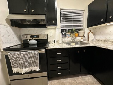 See the Matterport Virtual Tour!  This is a perfectly cozy 2nd on Sunrise Lakes Phase III in Florida - for sale on GolfHomes.com, golf home, golf lot
