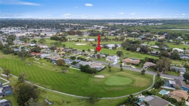 BEAUTIFULLY CURATED GOLF COURSE HOME TEE'D UP FOR HURRICANE on Seminole Lake Country Club in Florida - for sale on GolfHomes.com, golf home, golf lot