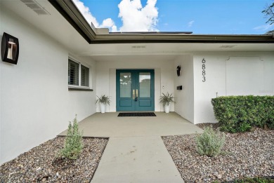 BEAUTIFULLY CURATED GOLF COURSE HOME TEE'D UP FOR HURRICANE on Seminole Lake Country Club in Florida - for sale on GolfHomes.com, golf home, golf lot