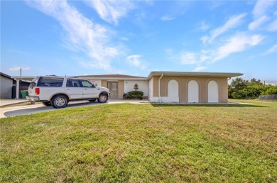 CHARMING MID-CENTURY HOME IN A QUIET CUL-DE-SAC WITH WATER VIEWS on Port Charlotte Golf Club in Florida - for sale on GolfHomes.com, golf home, golf lot