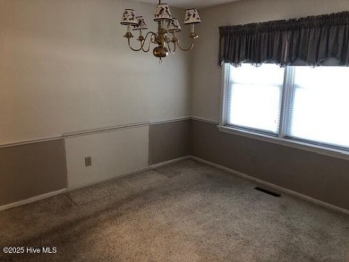 Welcome to easy living in this charming 1500 sqft single level on Pine Valley Country Club in North Carolina - for sale on GolfHomes.com, golf home, golf lot
