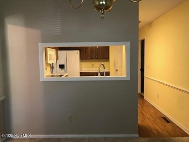 Welcome to easy living in this charming 1500 sqft single level on Pine Valley Country Club in North Carolina - for sale on GolfHomes.com, golf home, golf lot