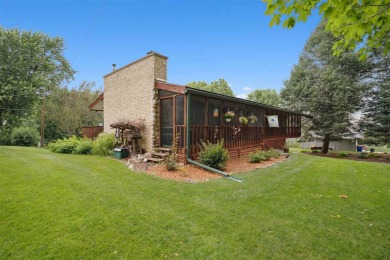 One of a kind lake area home with walls of windows!   This is on Lake McBride Golf Course in Iowa - for sale on GolfHomes.com, golf home, golf lot