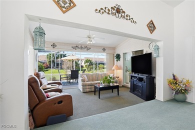 From the moment you step inside, cathedral ceilings fill the on Sabal Springs Golf and Racquet Club in Florida - for sale on GolfHomes.com, golf home, golf lot