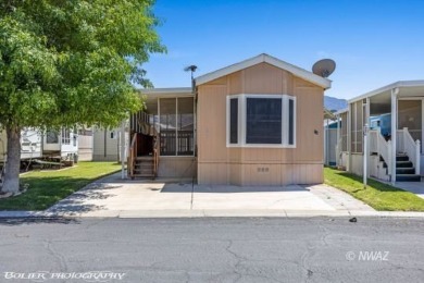 Located in the lovely 55 + Golf course community of Beaver Dam on Beaver Dam Resort in Arizona - for sale on GolfHomes.com, golf home, golf lot