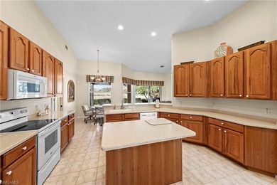 This four-bedroom, three-bathroom home is located within the on Fiddlesticks Country Club in Florida - for sale on GolfHomes.com, golf home, golf lot
