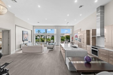 Experience luxury living in this beautifully renovated courtyard on Polo Club of Boca Raton in Florida - for sale on GolfHomes.com, golf home, golf lot