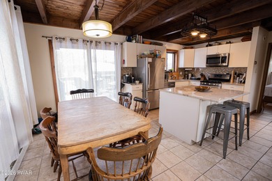 Welcome to this spacious and light-filled contemporary retreat on The Hideout Golf in Pennsylvania - for sale on GolfHomes.com, golf home, golf lot