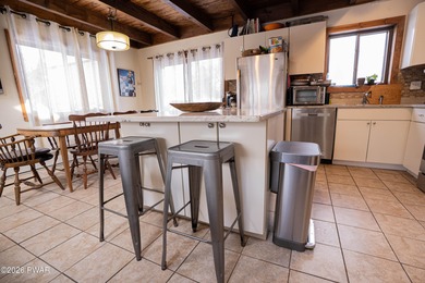 Welcome to this spacious and light-filled contemporary retreat on The Hideout Golf in Pennsylvania - for sale on GolfHomes.com, golf home, golf lot