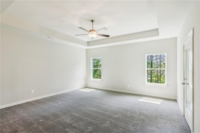 Popular and hard to find Ranch style home on a private homesite on Traditions of Braselton Golf Club in Georgia - for sale on GolfHomes.com, golf home, golf lot