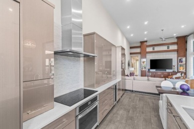 Experience luxury living in this beautifully renovated courtyard on Polo Club of Boca Raton in Florida - for sale on GolfHomes.com, golf home, golf lot