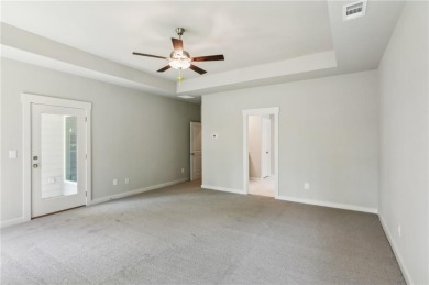 Popular and hard to find Ranch style home on a private homesite on Traditions of Braselton Golf Club in Georgia - for sale on GolfHomes.com, golf home, golf lot