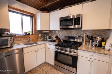 Welcome to this spacious and light-filled contemporary retreat on The Hideout Golf in Pennsylvania - for sale on GolfHomes.com, golf home, golf lot