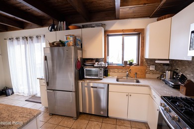 Welcome to this spacious and light-filled contemporary retreat on The Hideout Golf in Pennsylvania - for sale on GolfHomes.com, golf home, golf lot