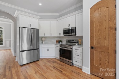 Welcome to 140 Pintail Run - beautifully renovated home nestled on Mallard Head Country Club in North Carolina - for sale on GolfHomes.com, golf home, golf lot