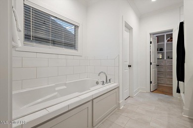 Gorgeous 4/3 Home with Pool in Camden of Lake Caroline. Welcome on Lake Caroline Golf Club in Mississippi - for sale on GolfHomes.com, golf home, golf lot